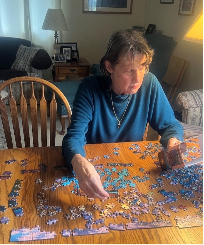 It's jigsaw puzzle time for Ms. Jacquline.