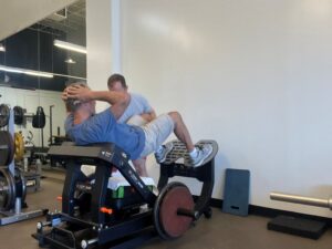 Duncan working with Trainer, Ian