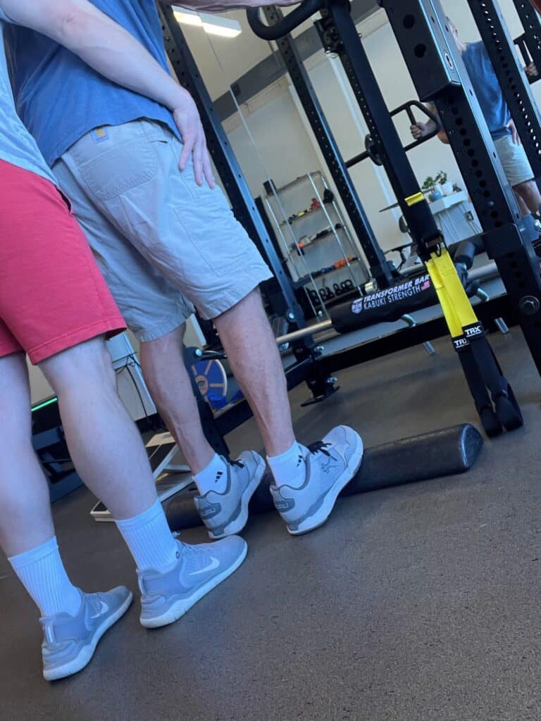 Duncan working with Trainer, Ian
