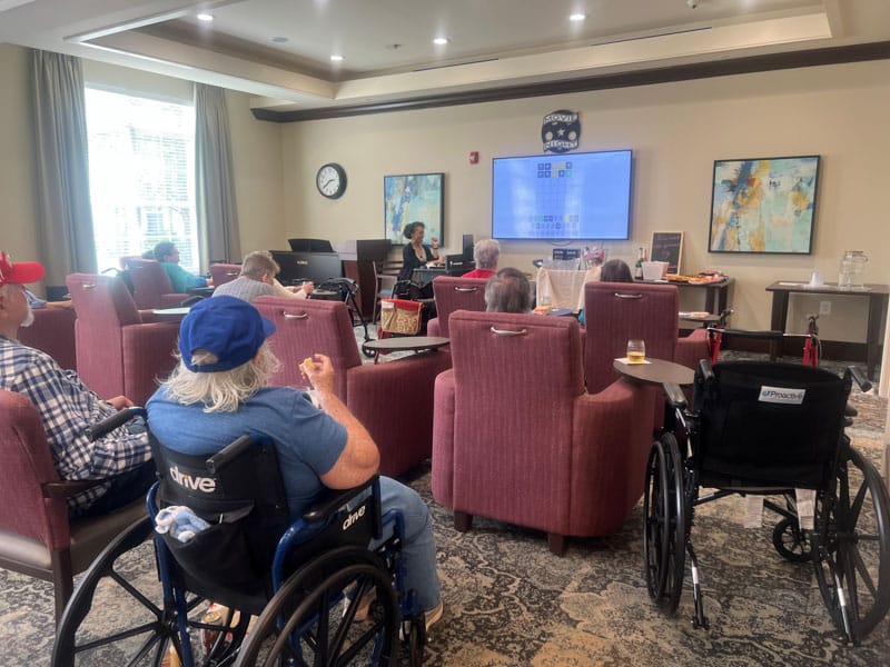 Heritage Village residents enjoy drinks, snacks, and camaraderie at IncrediCare’s Happy Hour.